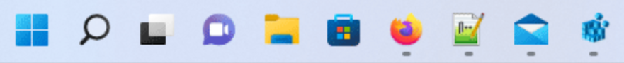 Barra de tareas de Windows: Inicio, Buscar, Vista de tareas, Chat, Explorador de archivos, Store, Firefox, Gráficos, Correo, Personas